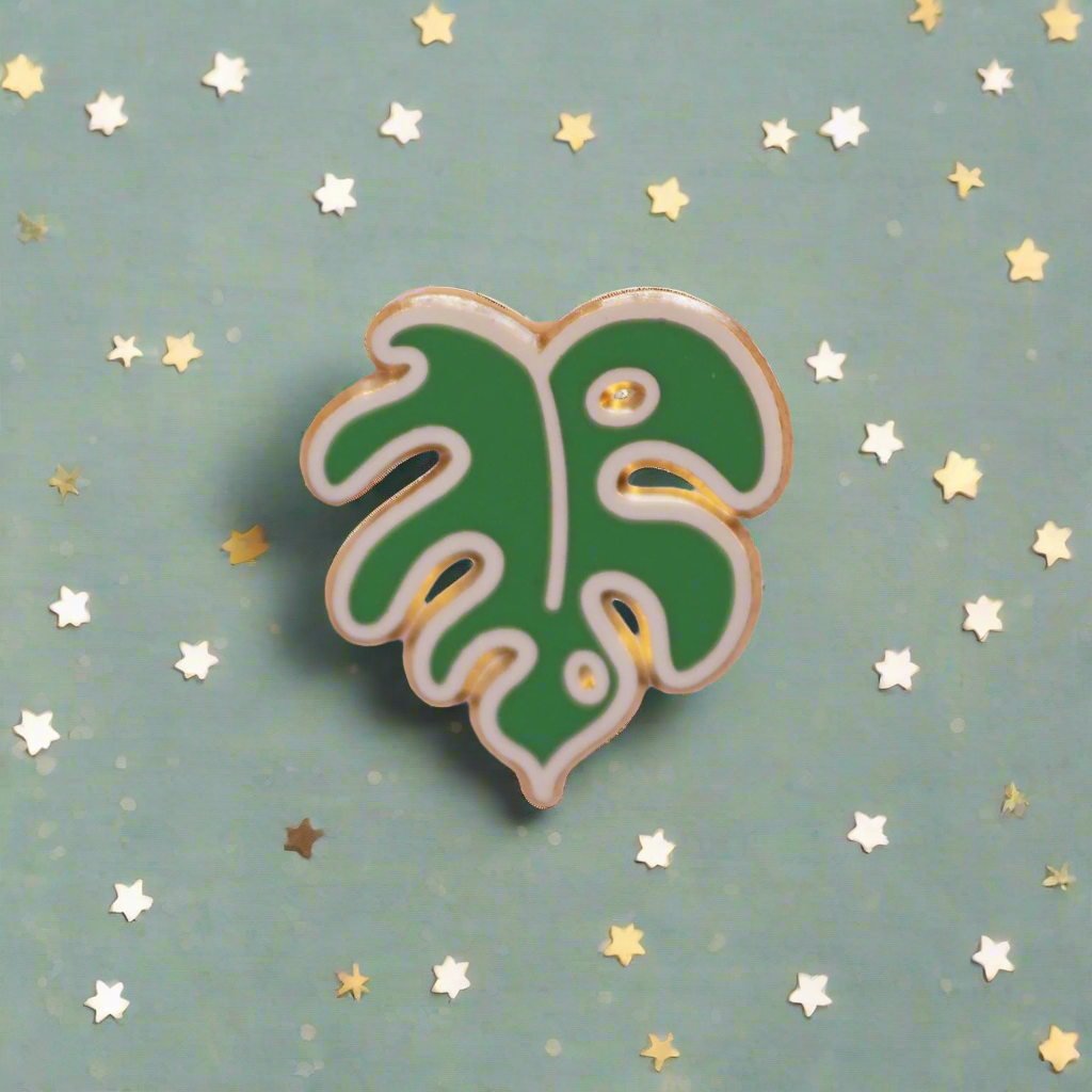 Green leaf-shaped pin on a pink and gray background