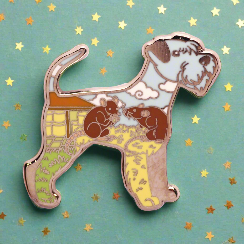 A silver metal enamel pin shaped like a Schnauzer dog with a rat on its hind leg, surrounded by a floral pattern on a pink and white background.
